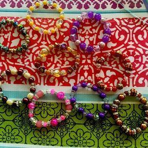 9 Beautiful beaded stretch bracelets all different colors